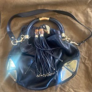 Gucci bag.    Can be hand or shoulder bag.   Beautiful condition.